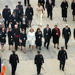 Survivors of September 11 attacks, victims' family members, clergy and police walk down to Ground Zero